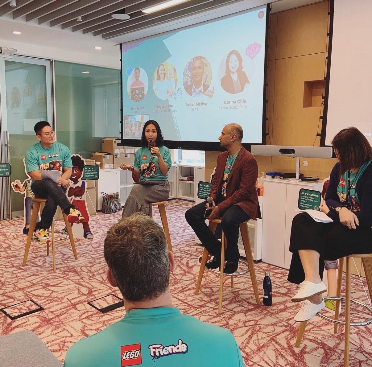 Eugenia on a panel at the LEGO office discussing inclusion and diversity