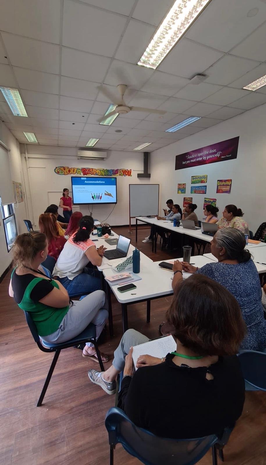 A Little Marvels therapist leading a training session for teachers
